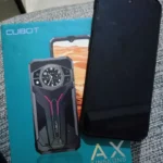 foto de depoimento de cliente da shopee mostrando o smartphone cubot kingkong ax e a caixa do produto